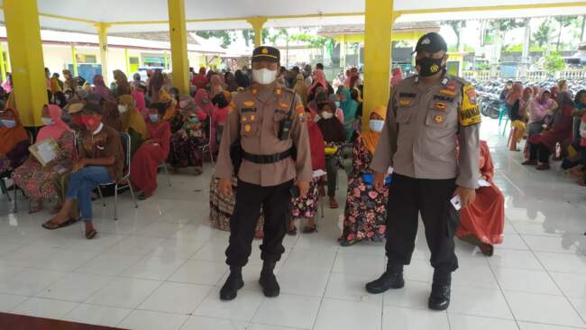 Kawal Penyuntikan Vaksin, Kapolsek Berharap Memutus Penyebaran Covid-19